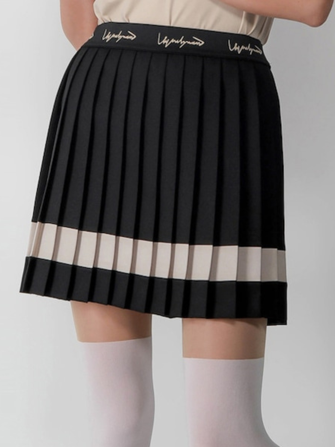 Falda en línea plisada con letras en la cintura CH356