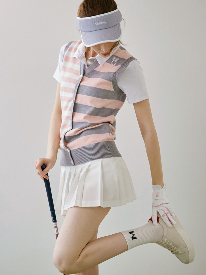 Minifalda plisada con bolsillo con logotipo y pantalón interior CH290