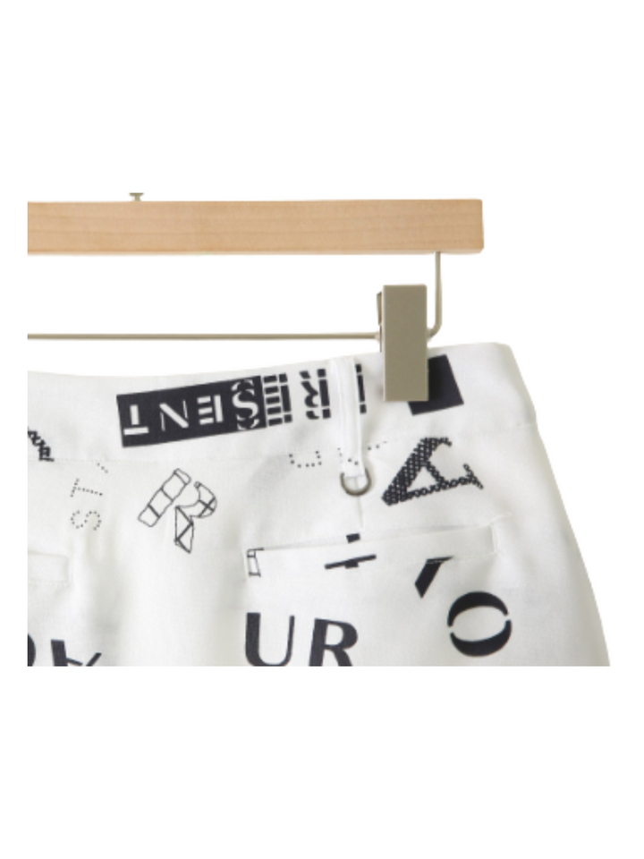 Minifalda plisada con estampado de letras CH289