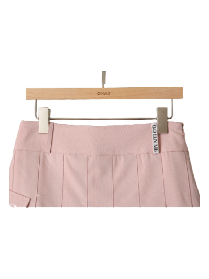 Minigonna plissettata con tasche logate e pantaloni interni CH290