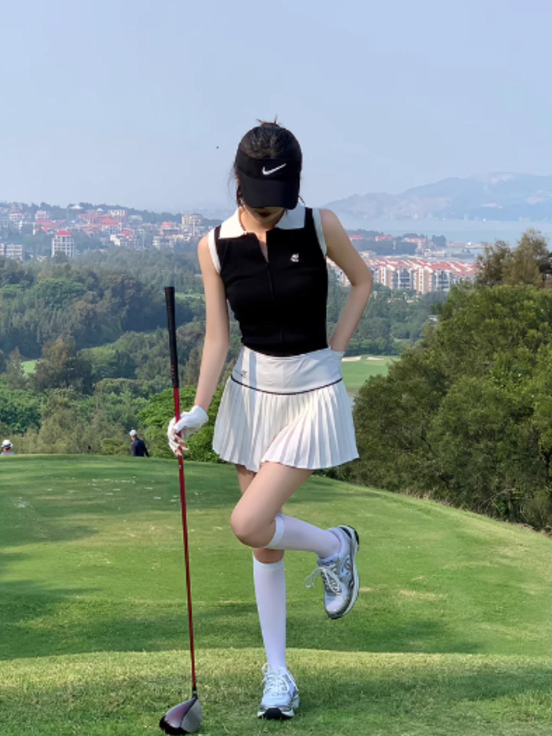 Falda plisada golf blanca CH630